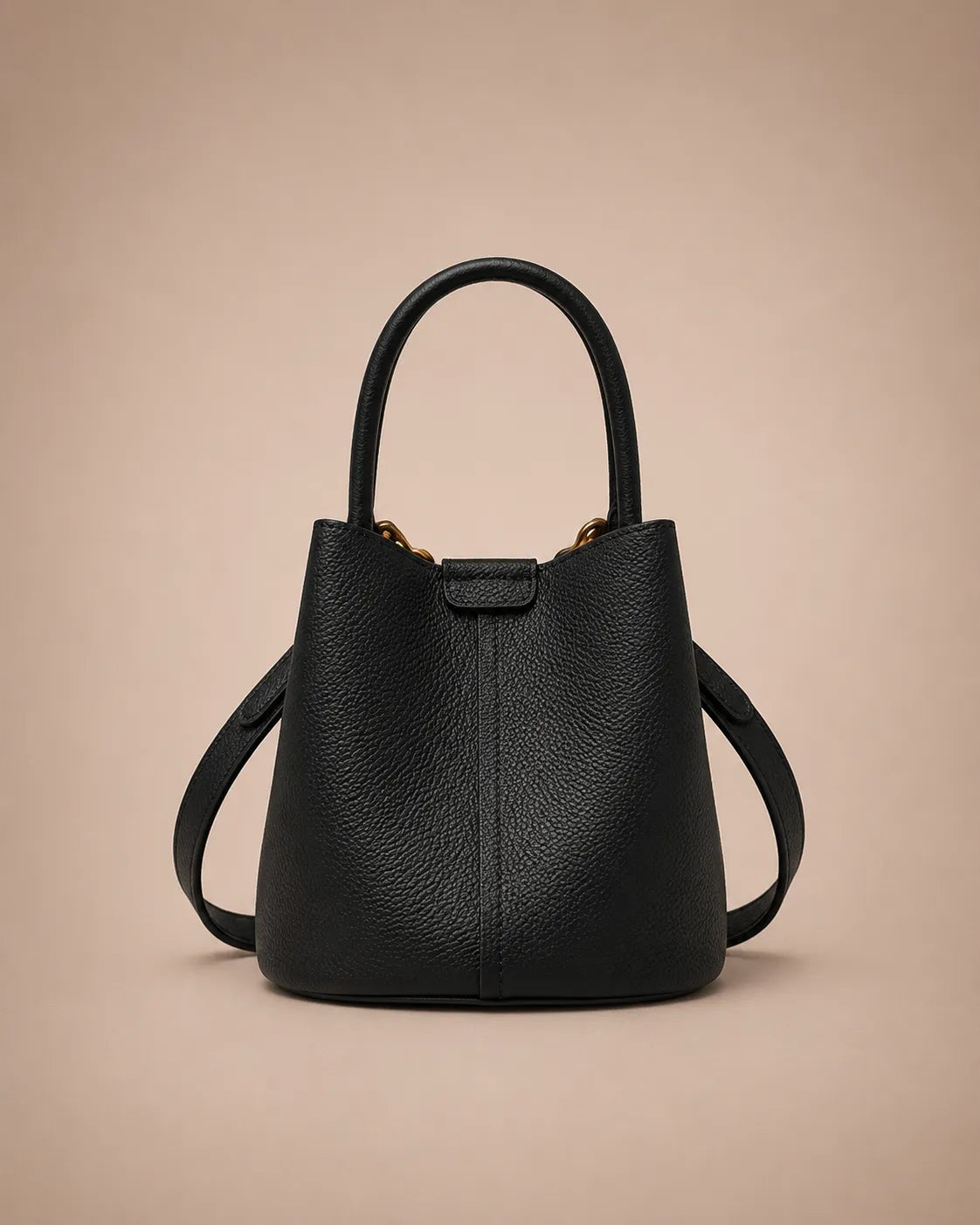 Charlotte genuine leather bucket bag in black crafted from premium leather with a structured bucket silhouette and versatile carrying options.