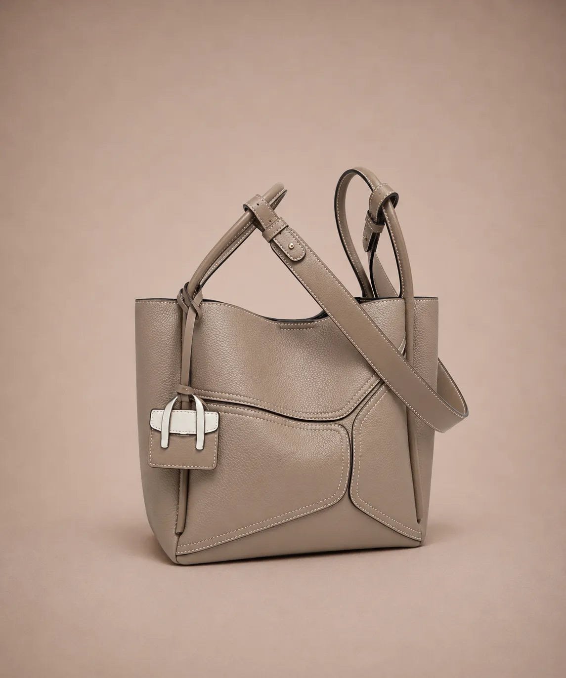 Delphine Leather Shoulder Bag in Elephant Gray genuine leather featuring a removable 60 cm shoulder strap, structured top handles, architectural panel detailing and premium craftsmanship by Malena London.