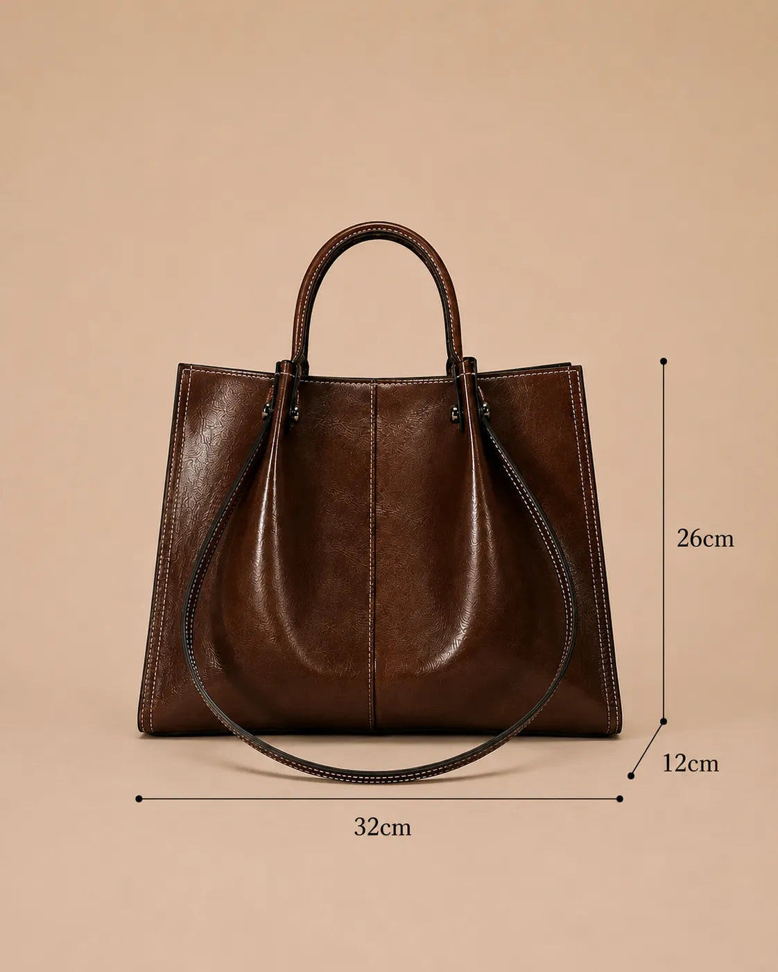 Dimensions view of the Edith Leather Tote Bag in Dark Chocolate genuine leather measuring 32 cm width, 26 cm height and 12 cm depth from The City Edit collection by Malena London.