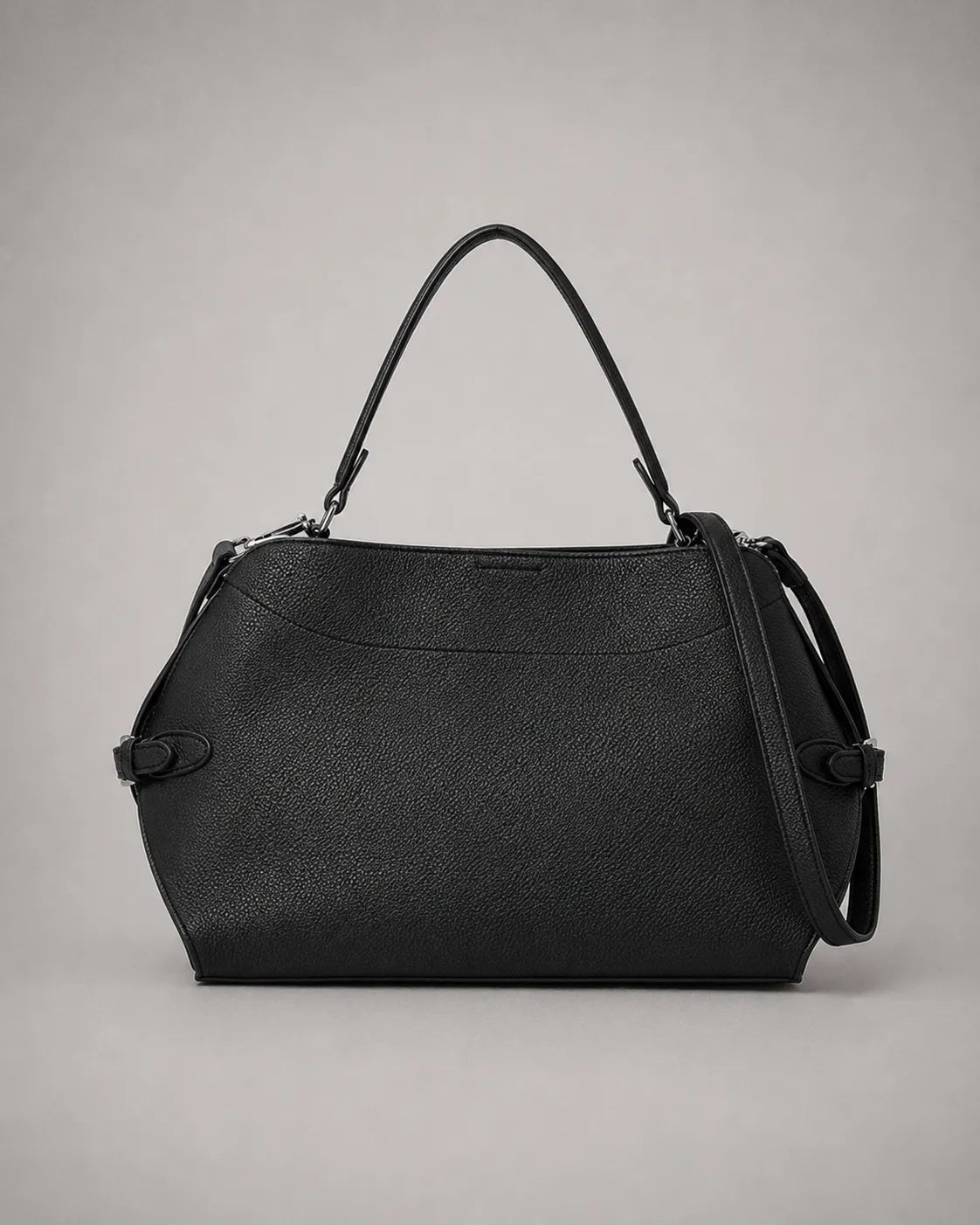 Back view of the Eliza genuine leather shoulder bag in Black featuring a softly structured silhouette, removable shoulder strap, adjustable crossbody strap, premium pebbled leather texture and elegant minimalist design by Malena London.