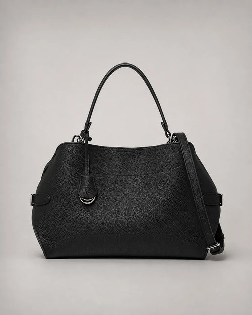 Front view of the Eliza genuine leather shoulder bag in Black featuring a softly structured silhouette, removable shoulder strap, adjustable crossbody strap, silver-tone hardware and premium pebbled leather by Malena London.