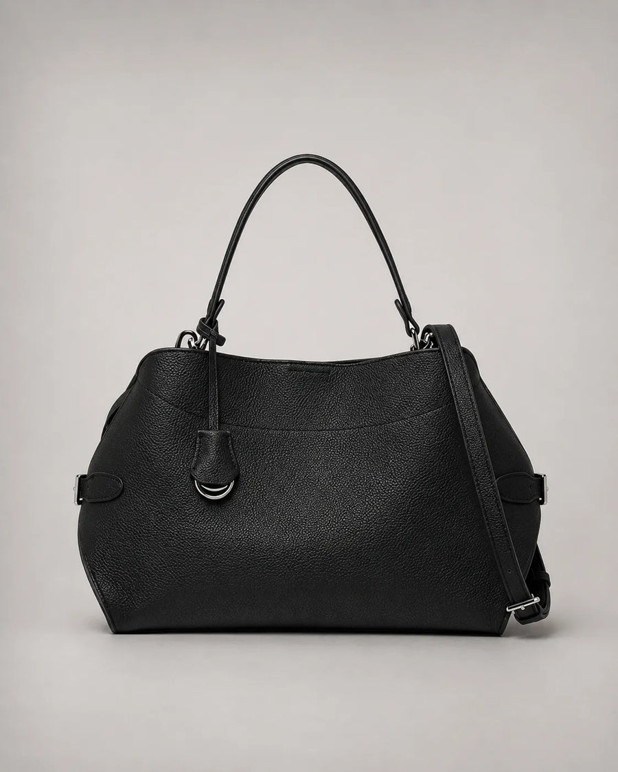 Front view of the Eliza genuine leather shoulder bag in Black featuring a softly structured silhouette, removable shoulder strap, adjustable crossbody strap, silver-tone hardware and premium pebbled leather by Malena London.