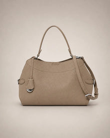 Front view of the Eliza genuine leather shoulder bag in Camel featuring a softly structured silhouette, removable shoulder strap, adjustable crossbody strap, silver-tone hardware and premium pebbled leather by Malena London.