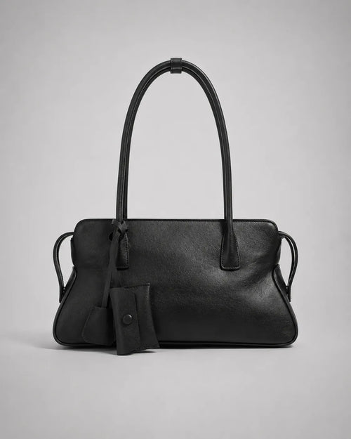 Georgia leather shoulder bag in Black genuine leather front view featuring a soft structured silhouette, double shoulder straps, decorative leather charms and secure zip-top closure from the Soft Structure collection by Malena London.