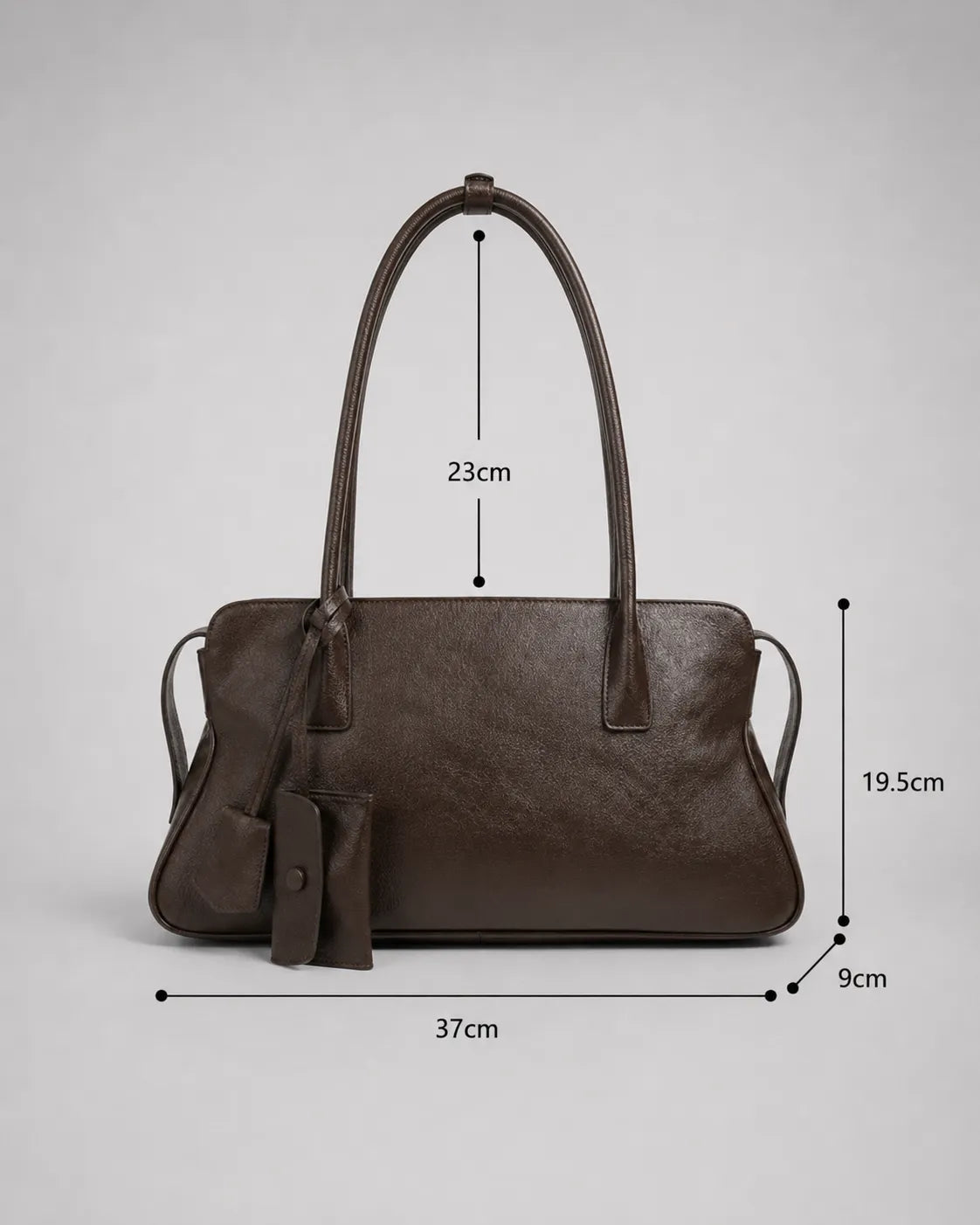 Georgia leather shoulder bag in Dark Chocolate genuine leather size guide showing dimensions of 37 cm width, 19.5 cm height, 9 cm depth and 23 cm handle drop from the Soft Structure collection by Malena London.
