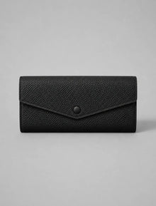 Leather Envelope Wallet in Black genuine leather featuring an elegant envelope flap design, textured leather finish and snap button closure. Women's leather wallet by Malena London.
