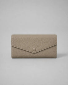 Leather Envelope Wallet in Elephant Gray genuine leather featuring an elegant envelope flap design, textured leather finish and snap button closure. Women's leather wallet by Malena London.