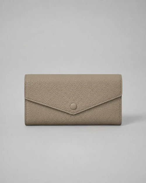 Leather Envelope Wallet in Elephant Gray genuine leather featuring an elegant envelope flap design, textured leather finish and snap button closure. Women's leather wallet by Malena London.