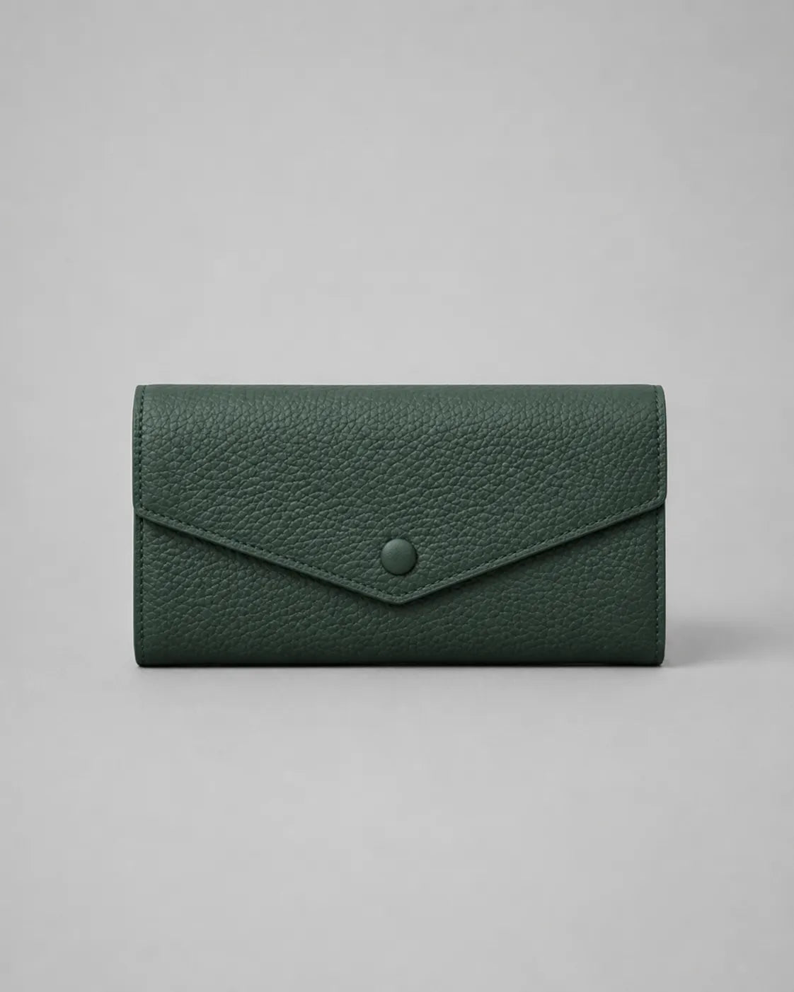 Leather Envelope Wallet in Forest Green genuine leather featuring an elegant envelope flap design, textured leather finish and snap button closure. Women's leather wallet by Malena London.