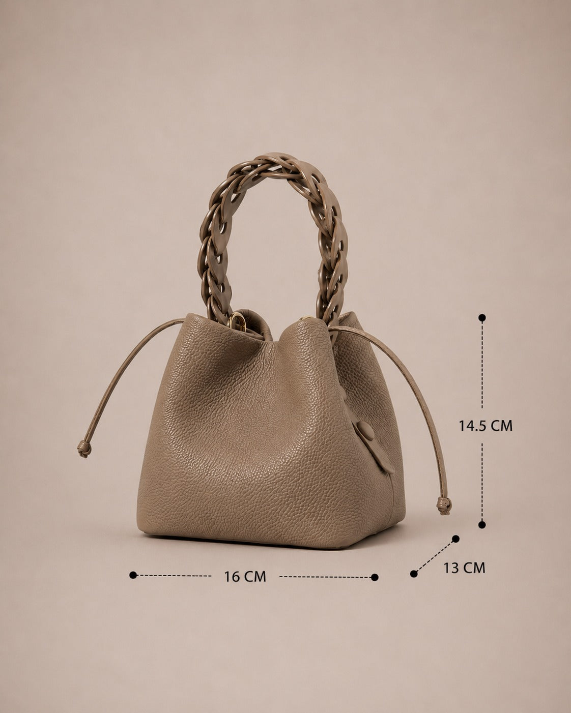 Dimensions image of the Léonie genuine leather bucket bag in Elephant Gray measuring 16 cm width, 13 cm depth and 14.5 cm height, featuring a braided top handle, drawstring closure and softly structured bucket silhouette by Malena London.