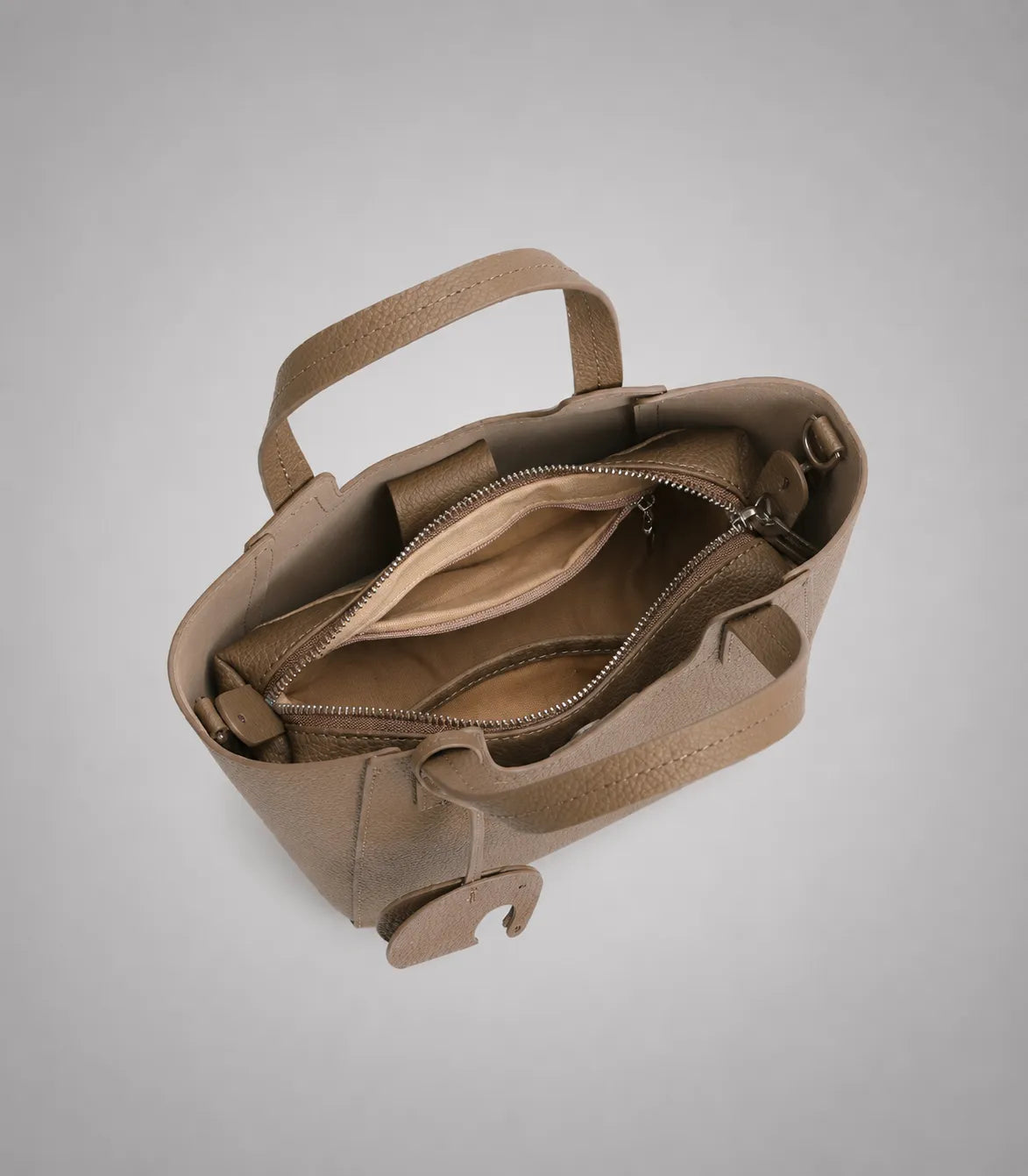 Interior of the Louise everyday leather tote bag featuring organized compartments, removable zip pouch and large capacity storage.