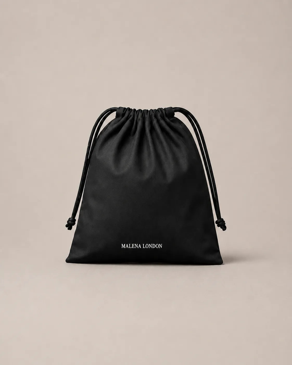 Premium protective dust bag designed to store and preserve Malena London leather handbags between uses