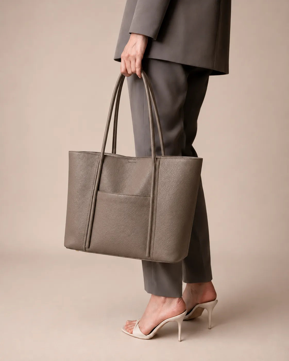 Close-up of The Vivienne luxury genuine leather tote bag in Elephant Gray, premium women's leather handbag with a spacious design for work and daily essentials.