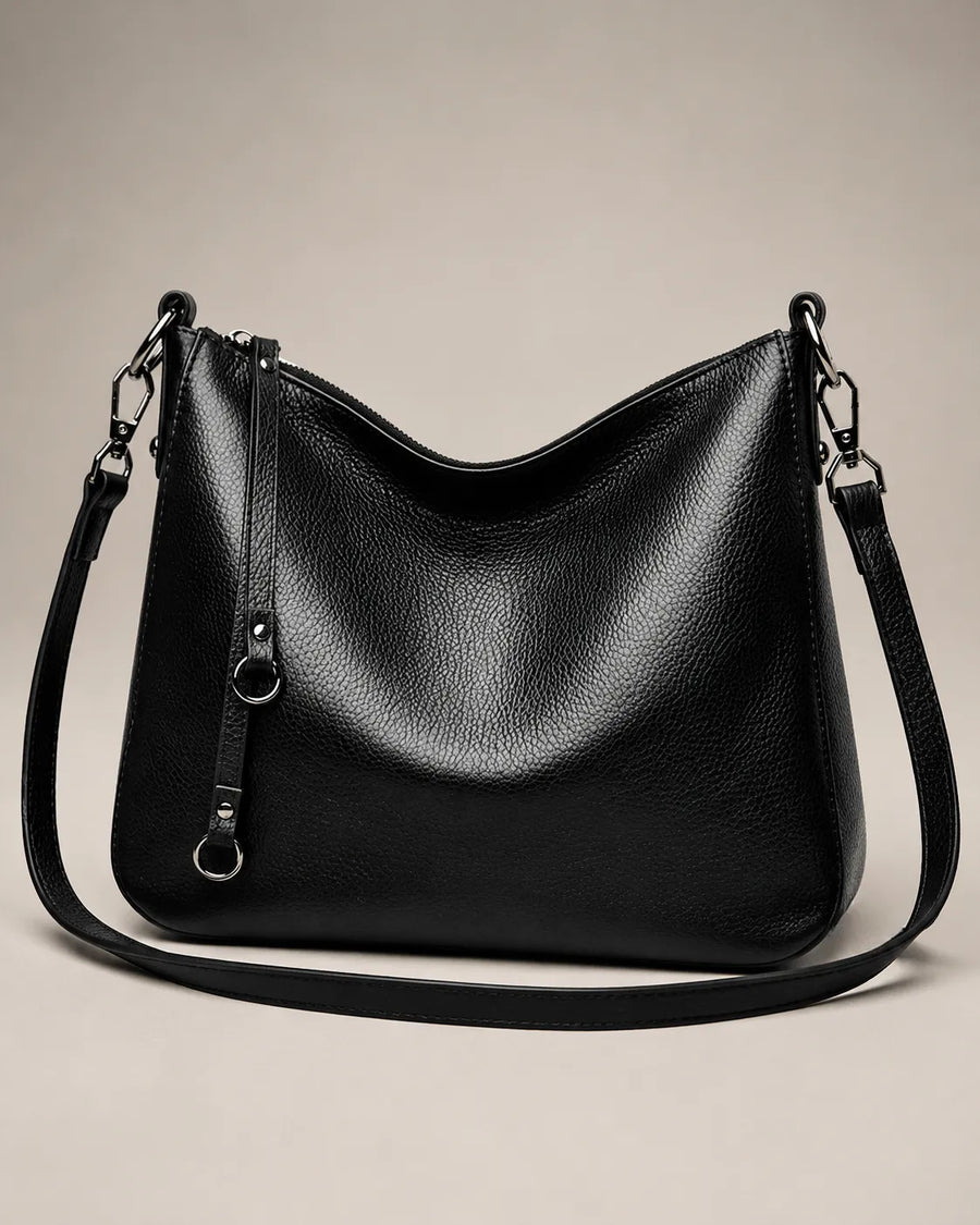 Front view of the Noémie soft genuine leather hobo shoulder bag in black showing the relaxed silhouette and double straps.