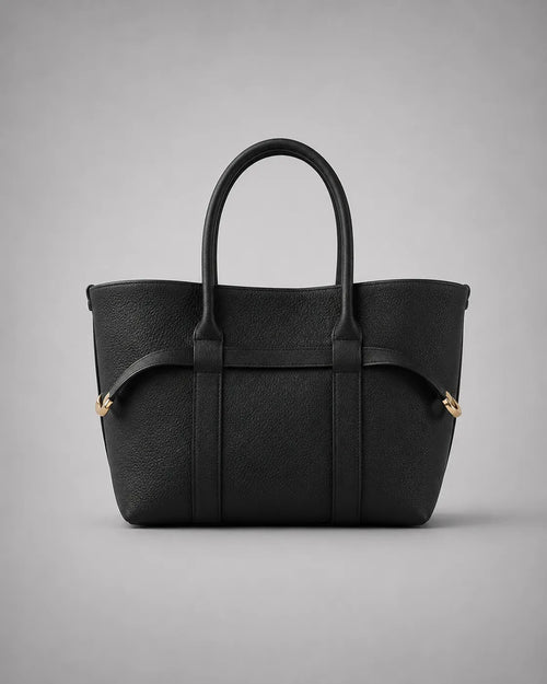 Rose Leather Tote Bag in Black genuine leather shown from the front, featuring a structured silhouette, double top handles and refined gold-tone hardware from The City Edit by Malena London.