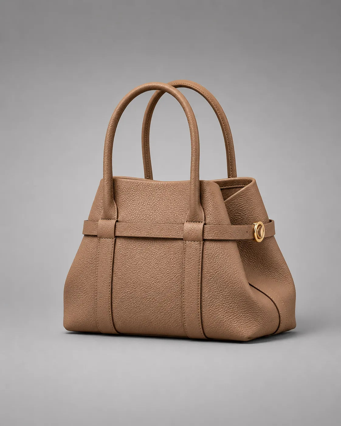 Rose Leather Tote Bag in Brown genuine leather shown from an angled front view, highlighting its structured shape, premium pebbled leather construction and refined gold-tone hardware.