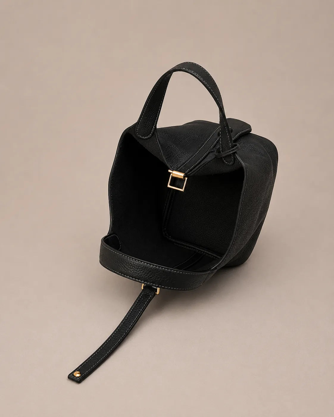 Scarlett genuine leather bucket tote bag in black leather open interior view showcasing spacious compartment and premium craftsmanship