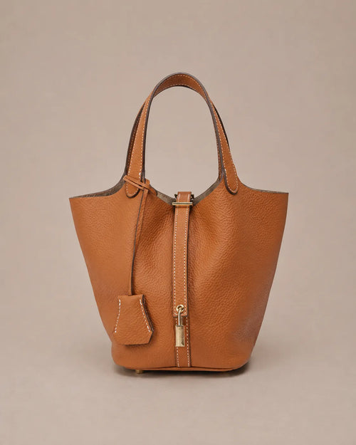 Scarlett genuine leather bucket tote bag in brown leather front view with premium pebbled texture and elegant bucket silhouette