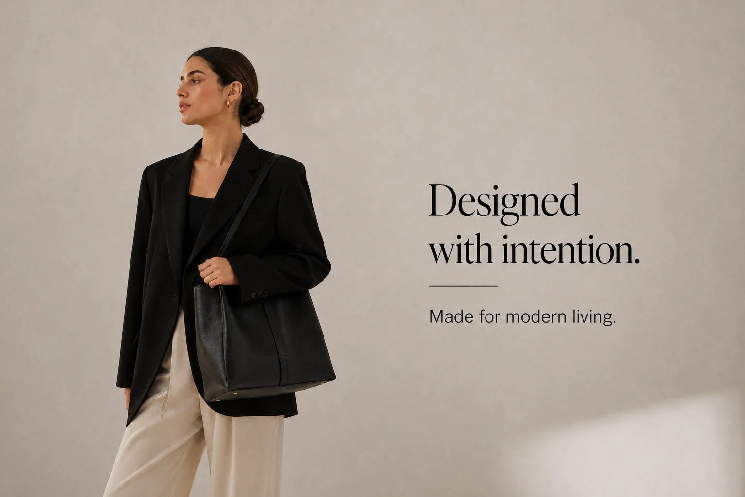 Woman carrying a soft leather hobo bag with relaxed silhouette designed for everyday elegance by Malena London