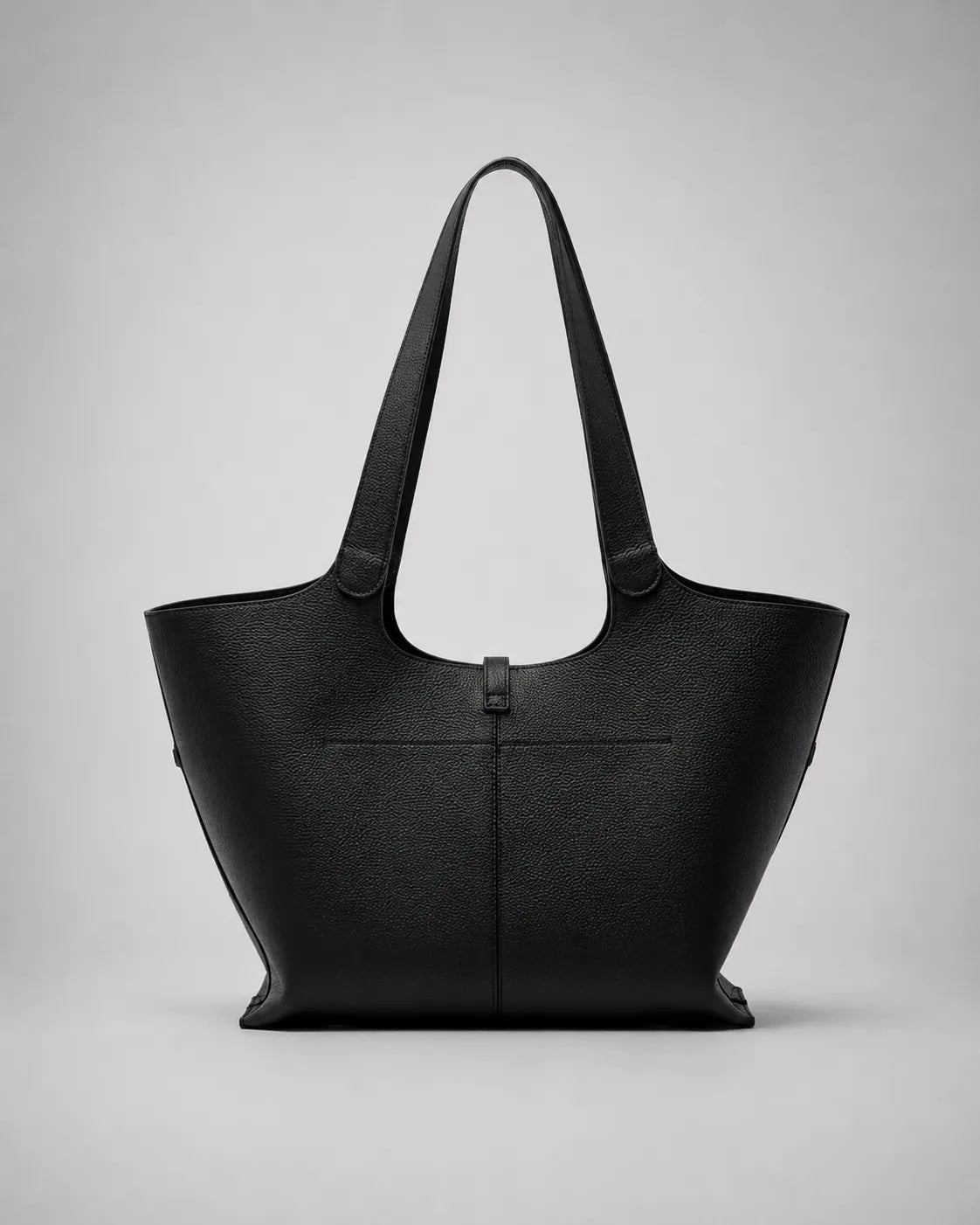 Victoria genuine leather work tote bag in black shown from the back, highlighting its structured silhouette, spacious interior capacity and elegant minimalist design.