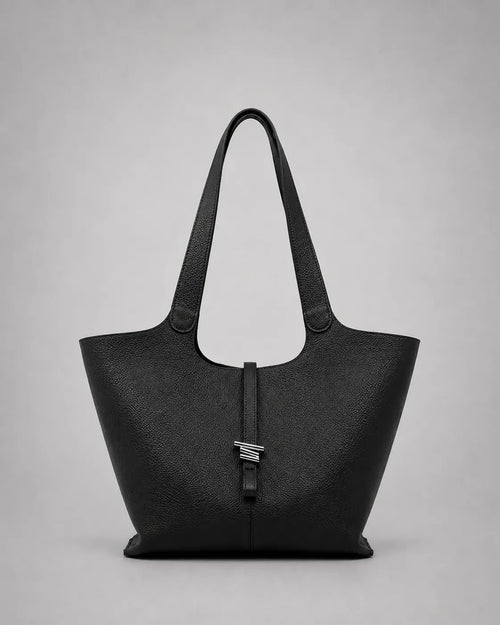 Victoria genuine leather work tote bag in black displayed from the front, featuring a spacious silhouette, elegant shoulder straps and a refined minimalist aesthetic.