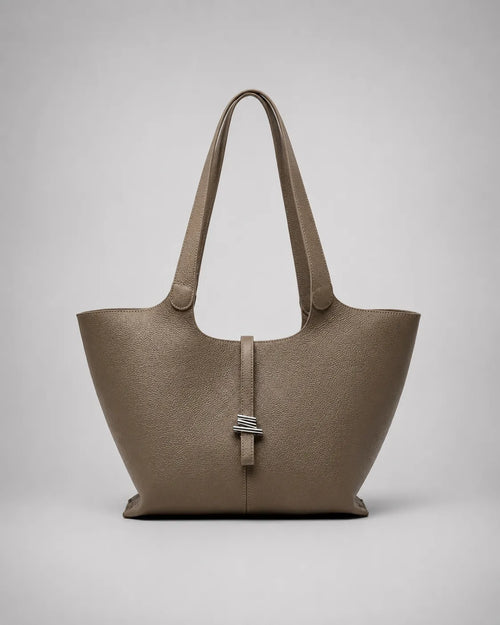 Victoria genuine leather work tote bag in Elephant Gray displayed from the front, featuring a spacious silhouette, elegant shoulder straps and a sophisticated city-inspired design.